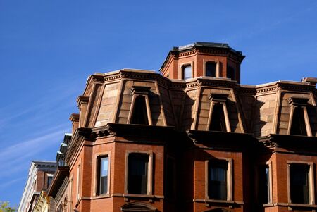 dramatic shot of upper floors of fancy old apartment building in downtown bostonの写真素材
