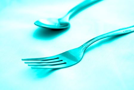beautiful artistic tinted image of fork and spoonの写真素材