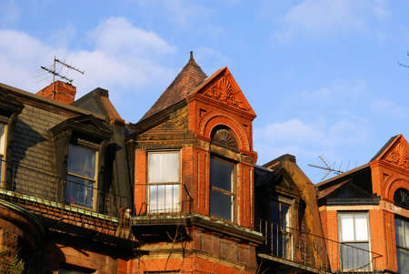 ornately carved eves of row houses on newbury street in bostonの写真素材
