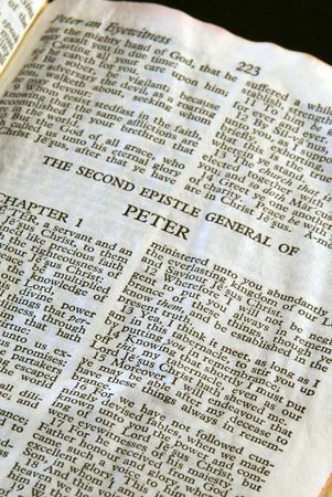 Bible Series. close up detail of antique holy bible open to the gospel according to the second  general epistle of peter in the new testamentの写真素材
