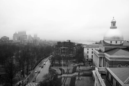 overlooking the city of boston on a rainy morning, showing the clouds and trafficの写真素材