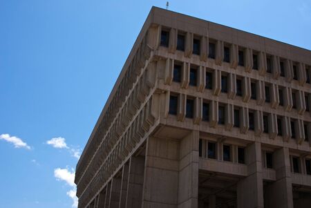 looking up at boston city hall showing its angular shape on a clear dayの写真素材