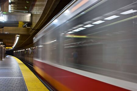 redline train departing from the subway station in boston massachusettsの写真素材
