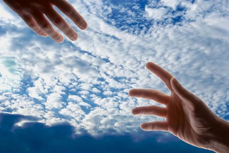 two male hands with fingers outstretched reaching out toward each other