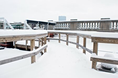 roofdeck in the city of boston covered with snowの写真素材