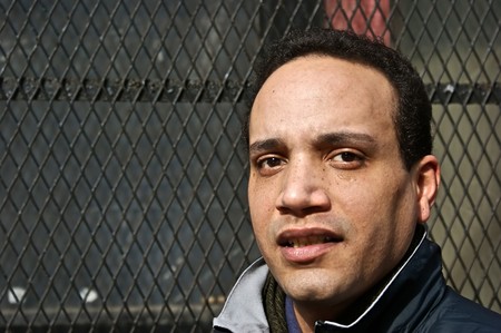 urban black american male with serious look on face
