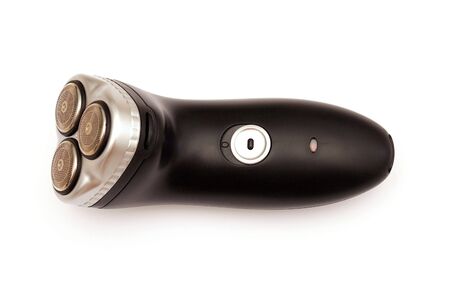 three head electric shaver on white.の写真素材