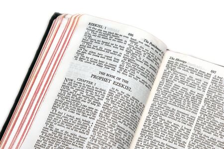 holy bible open to the book of  the prophet ezekiel, on white backgroundの写真素材