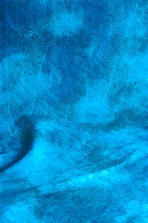 A blue mottled backdrop cloth with wrinkles.の写真素材