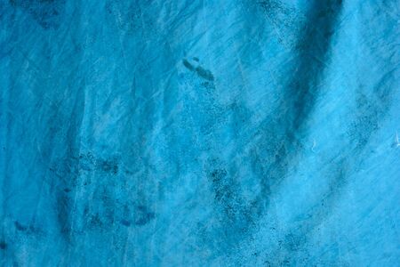 detail of blue mottled tie dyed background fabric.の写真素材
