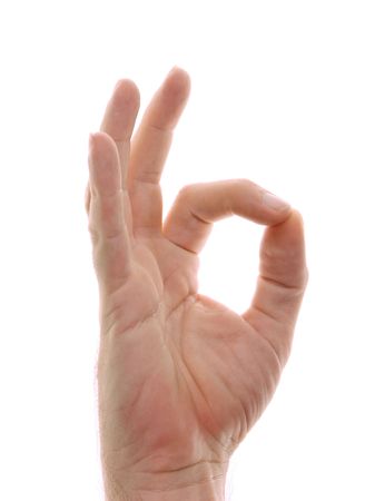 A man's hand is shown in yoga gyan mudra hand position used for grounding. Representing starting place or home, back to your roots, a simpler time. Clears the mind. Shot over white.の写真素材