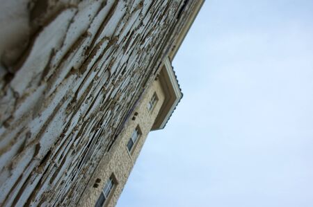 looking up at a modern florida high rise in the early morning.の写真素材