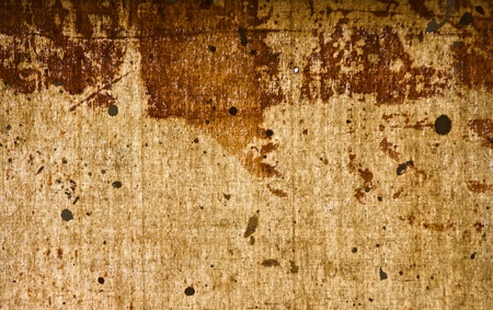 close up of dirty, stained painter's tarp lit from behind   
