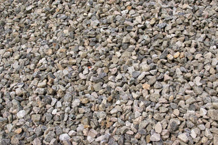 Large pile of small granite stones fills image, outdoors in morning.の写真素材