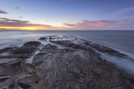 The beautiful scenery of the dusk in Kudat Sabah Borneo. Long exposure photograph with grain. Image contain certain grain or noise and soft focus.の写真素材