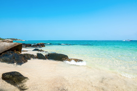 Clear water and Beautiful White Sand Beach with Stone shores on Samet Island, Rayong, Thailand.の写真素材