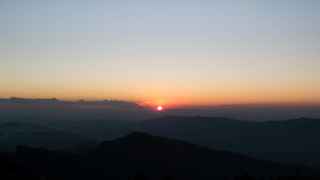 The Last light above the mountains of Phu Chi Fa, Chiang Rai, Thailand.の写真素材