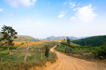 Road Through hills and fields.の写真素材