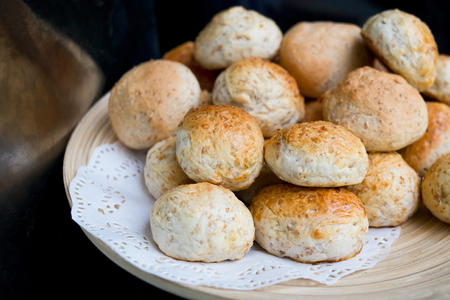 Crusty Bread Rolls on a Wood Plate.の写真素材