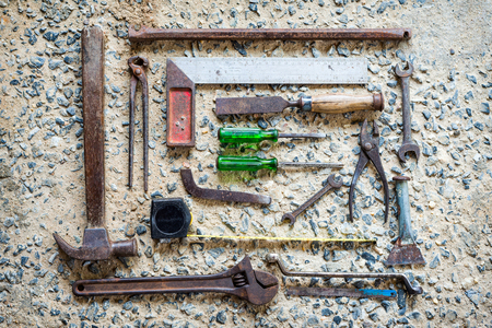 Old Tools set Placed on the cement floor.の写真素材