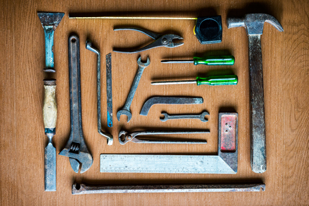 Old Tools set Placed on the wooden floor top view.の写真素材