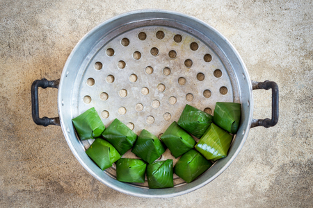 Stuffed dough pyramid in the steamer, Dessert of thai.の写真素材
