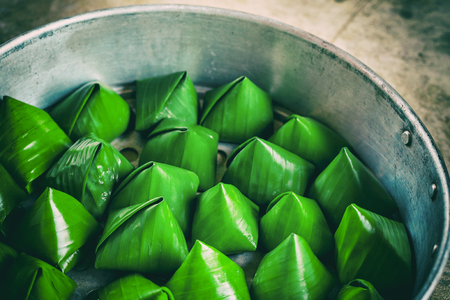 Stuffed dough pyramid in the steamer, Dessert of thai.の写真素材