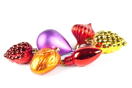 Christmas and new-year decorations. Varicoloured christmas toys on white backgroundの写真素材