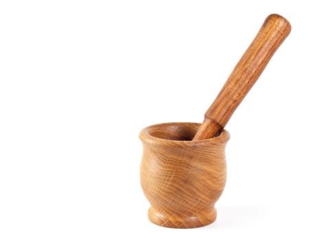 Wooden mortar, pestle isolated on white backgroundの写真素材