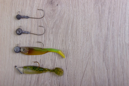 spotted wobbler for fishing on wooden backgroundの写真素材