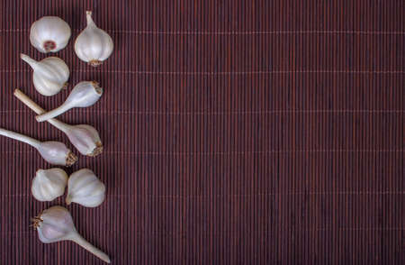 Garlic spices food in Thai food on bamboo backgroundの写真素材