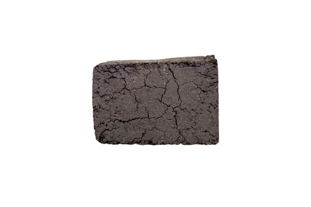 Black charcoal cubes isolated on white background.の写真素材