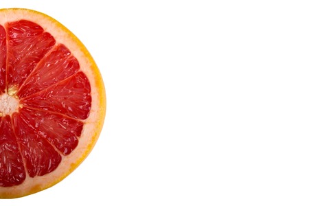 slice of grapefruit isolated on white background.の写真素材