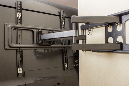 LCD display on the TV bracket. Swivel bracket for TV.の写真素材