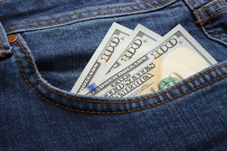 Money in the jeans pocket. Business concept. pocket money.の写真素材