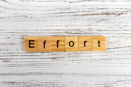 EFFORT word made with wooden blocks concept