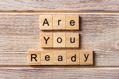Are You Ready word written on wood block. Are You Ready text on table, concept.の写真素材