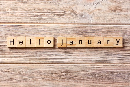 hello january word written on wood block. hello january text on table, concept.の写真素材