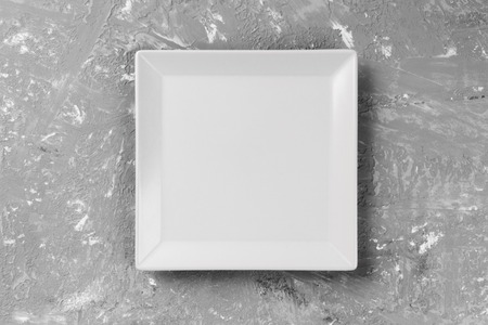 square plate on the background of a gray table.の写真素材