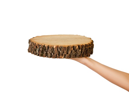 woman hand holding Empty wooden plate. perspective view, isolated on white background.の写真素材