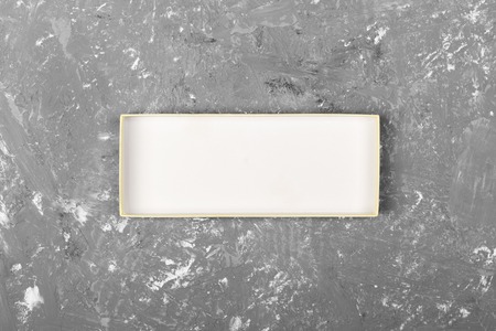 cardboard box on gray cement background surface. top view blank for you design.