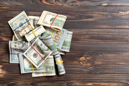 US Dollar bills bundles stack. one hundred dollar bills with stack of money in the middle. Top view...