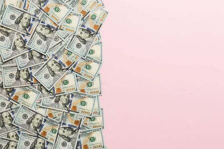 dollar bills a on a light colored background. copy space, top view business concept.の写真素材