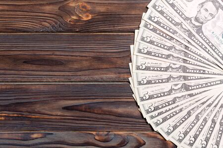 A Hundred dollar fan close up, Top view of business concept on colored background.