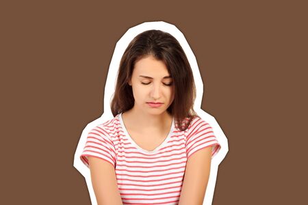 young beautiful sad woman serious and concerned. worried and depressed girl isolated white background. emotional girl Magazine collage style with trendy color background.の写真素材