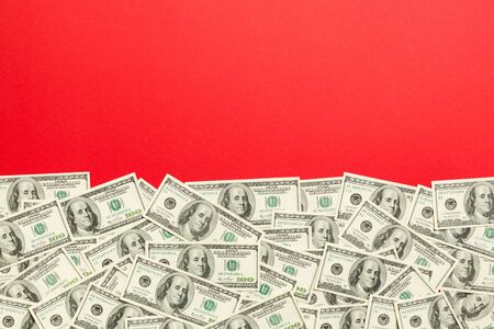 dollar bills a on a light colored background. copy space, top view business concept.