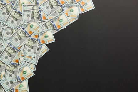 dollar bills a on a light colored background. copy space, top view business concept.