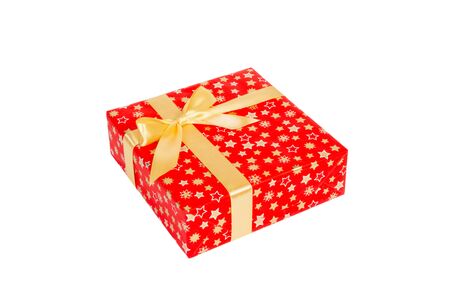 Christmas or other holiday handmade present in red paper with Gold ribbon. Isolated on white background, top view. thanksgiving Gift box concept.の写真素材
