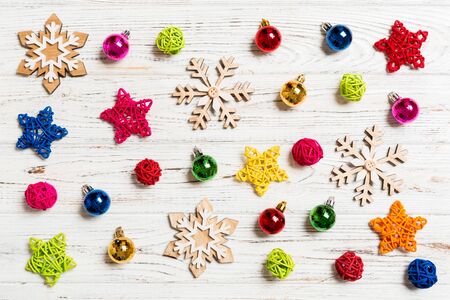 Top view of Christmas toys on wooden background. New Year ornament. Holiday concept.の写真素材