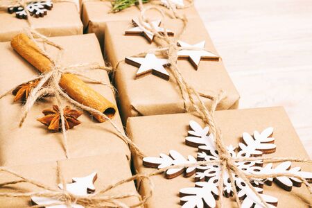 Christmas presents with hand made decorations. Place for text. decorations for wrapped in craft...